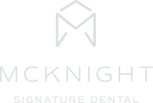 McKnight Signature Dental Logo for 'McKnight Signature Dental' featuring a geometric 'M' design above the business name in modern, uppercase lettering